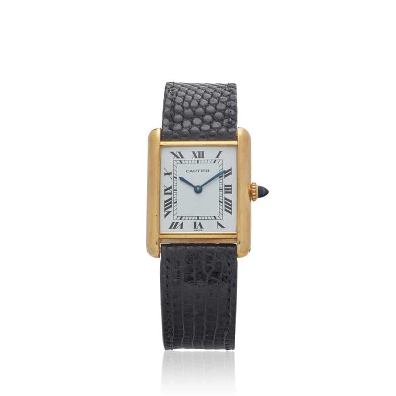 Amura,AmuraWorld,AmuraYachts, Cartier Tank de 18k. Estimado 3,000-5,000 dólares.