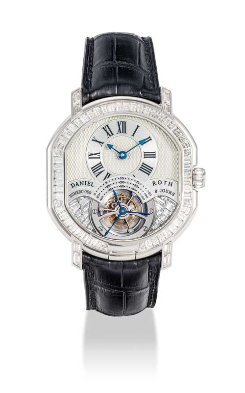 Amura,AmuraWorld,AmuraYachts, Daniel Roth. Tourbillon de doble esfera con forma de barril, engastado con diamantes talla baguette, con fecha y reserva de marcha de 8 días, circa 1995. Vendido por 55,835 dólares en la subasta «The Masterpiece Auction and Important Watches including an Important Private Asian Collection Part One» de Christie's en Hong Kong, 2019