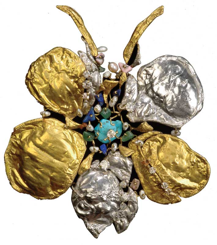 Flower of Eden, gold, platino and stones. 